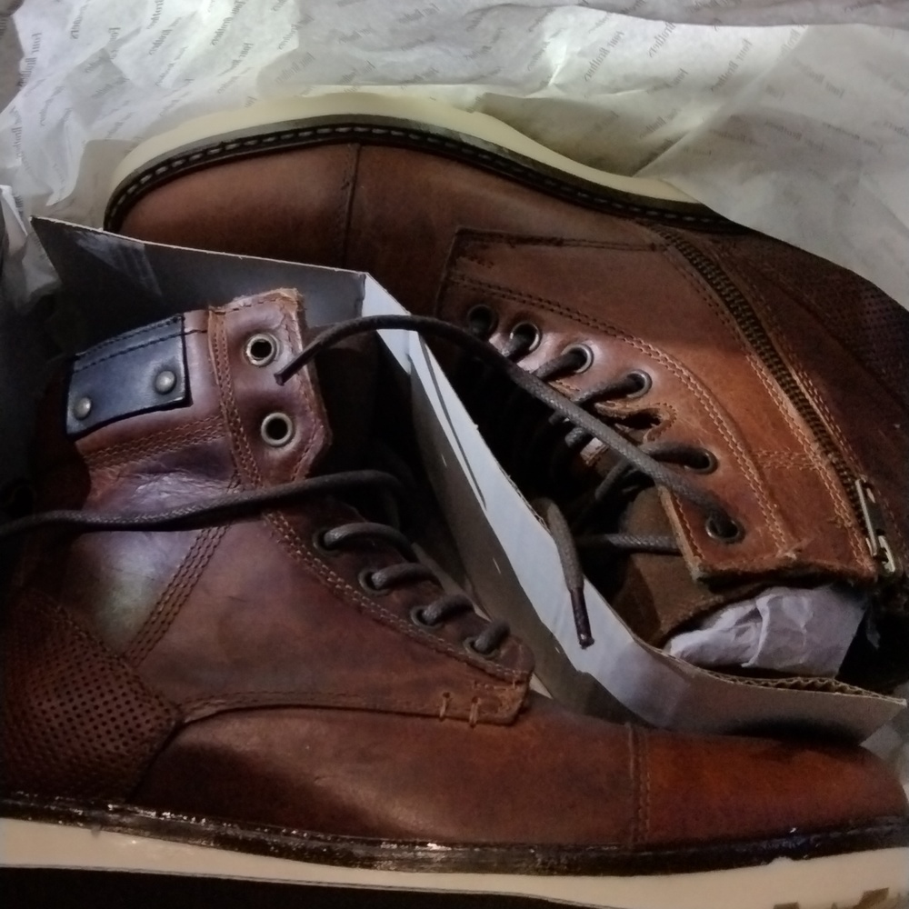 Brown boots size 8.  Brand four Brothers